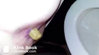 Girl takes a shit in the toilet