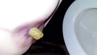 Girl takes a shit in the toilet