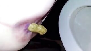 Girl takes a shit in the toilet