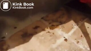 Ebony cleaning ass while doing enema