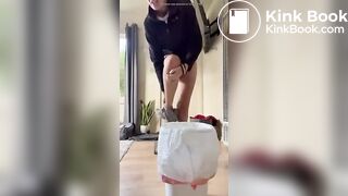 Fit tattooed chick shitting diarrhea in bucket