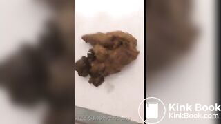 girl pooping on white napkin