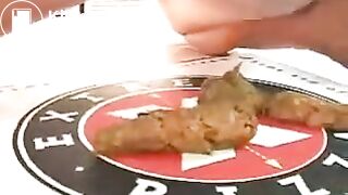 Brown shit on pizza box