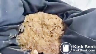 Sexy shitting in black pants