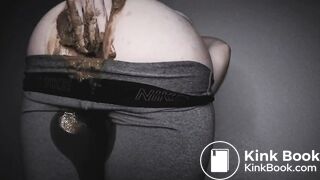 Women shitting in grey leggings