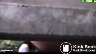 Woman pooping at festival