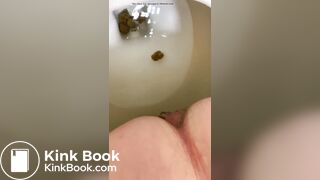 Girl shitting constipated turd - video 2