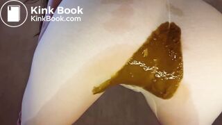 Diarrhea in white leggings - video 2