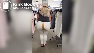 Blonde girl shits in white jeans