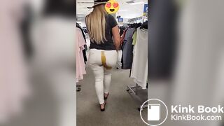 Blonde girl shits in white jeans