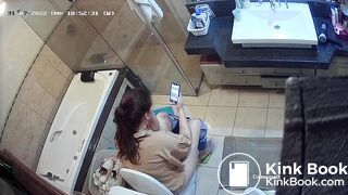 Woman pooping in home toilet 4