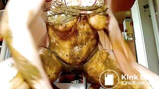 Beautiful babe rubbing shit on her half naked body