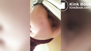 Cutie pooping on toilet