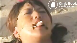 Japanese girls shit on a human toilet in the sand