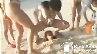 Japanese girls shit on a human toilet in the sand