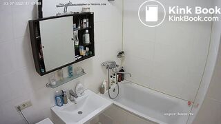 Woman pooping in Toilet ...