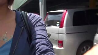 Asian girl pooping in public parking lot