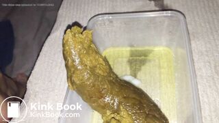 Girl shitting big turd into a plastic container