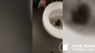 Licking a shit filled toilet