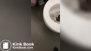 Licking a shit filled toilet