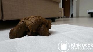 girl puts a leg up on her couch and takes huge dump