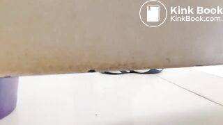 Girl pooping in toilet