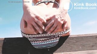 Taking a dump over her neighbor's fence