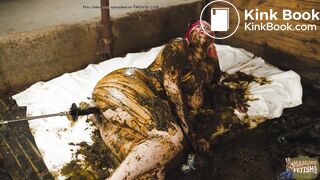 Catwoman Lyndra in cowshit