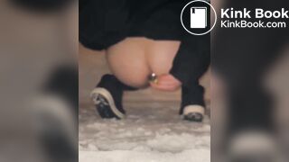 Girl taking a shit in the snow