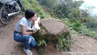 Girl eats her shit from diaper outdoor