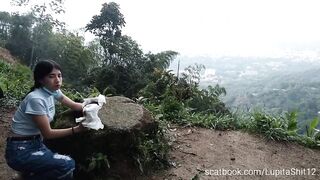 Girl eats her shit from diaper outdoor