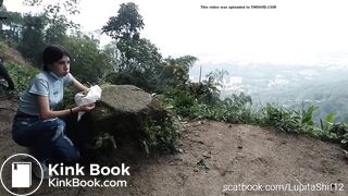 Girl eats her shit from diaper outdoor