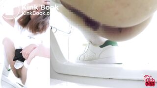 Japanese girl looks at you while pooping (Side POV)