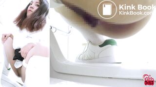 Japanese girl looks at you while pooping (Side POV)