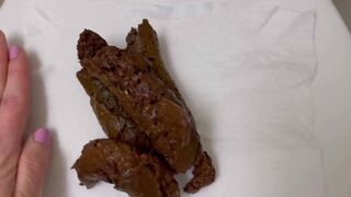 the camera focused on the poop coming out of the ass, d