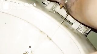 Asian woman having a shit - video 2