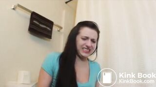 Girl straining on toilet