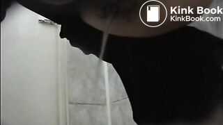 Woman in a coat spied taking an explosive shit