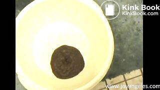 Pooping in yellow container