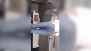 Girl messing diaper while working