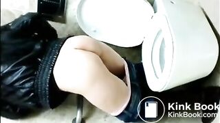 Brunette poops in public toilet