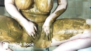 Busty blonde slut smears her body with shit