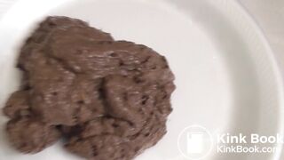 Beautiful brunette shitting on a plate