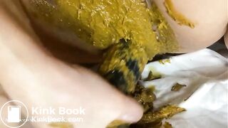 beautiful girl playing with her shit in her vagina