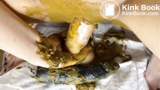 beautiful girl playing with her shit in her vagina