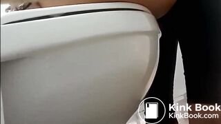 Woman Pooping in a Stall