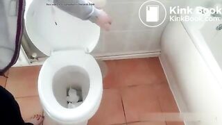 Lovely woman inaugurating her new toilet