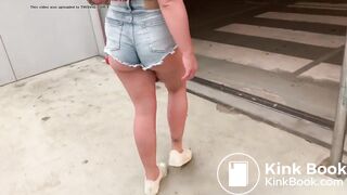 in the parking lot, the guy helped his girlfriend wash