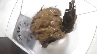 Girl fills up a container with shit