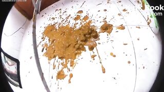 Girl poops purple panties